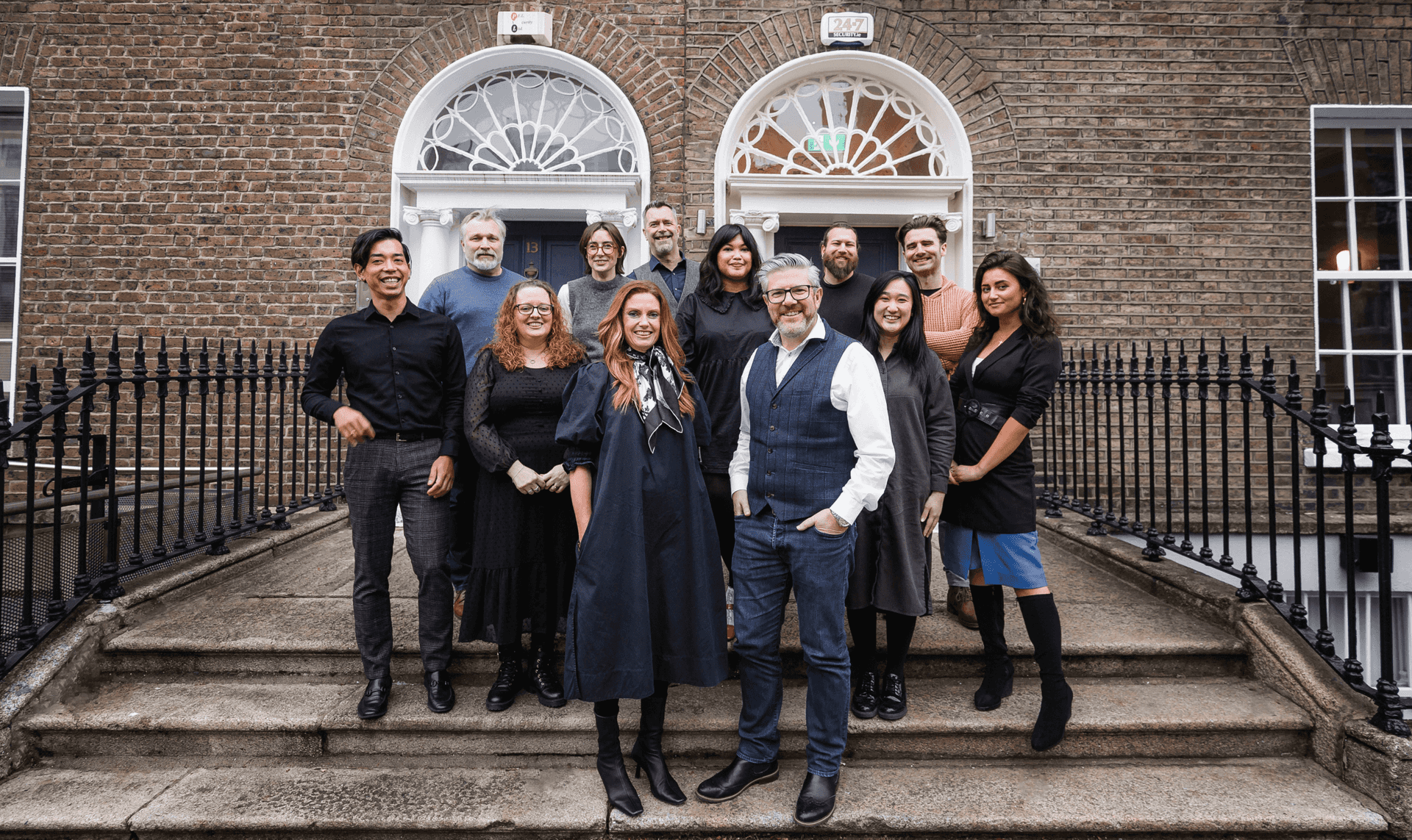 Agency X team standing outside 12 Hatch Street